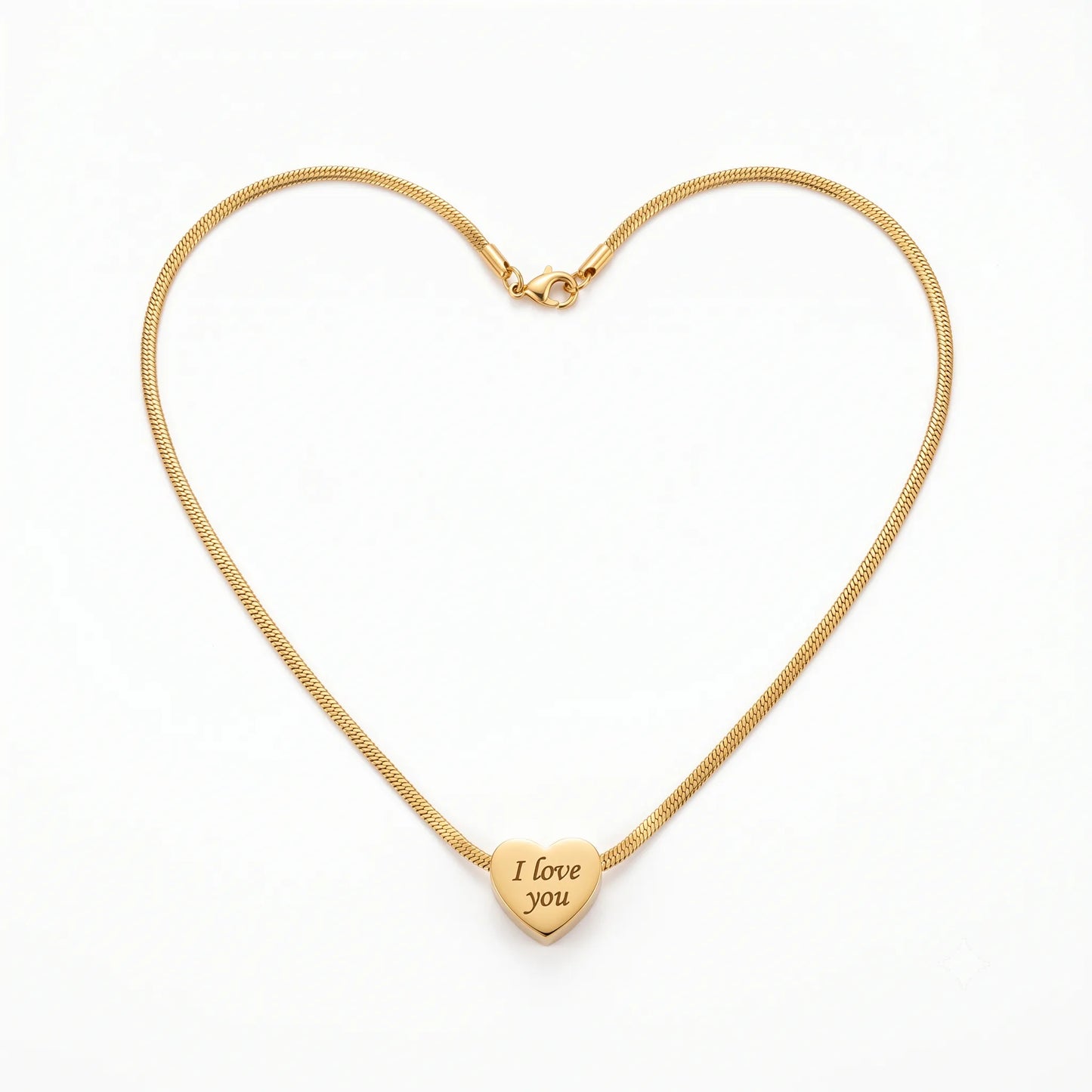 Gold necklace forming a heart shape with a heart-shaped pendant engraved 'I love you' on a white background.