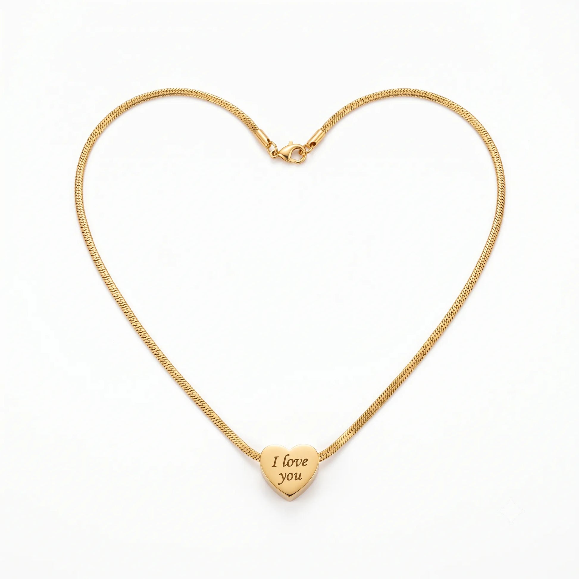 Gold necklace forming a heart shape with a heart-shaped pendant engraved 'I love you' on a white background.