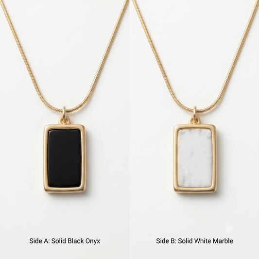 Two gold necklaces with pendant stones on a white background
