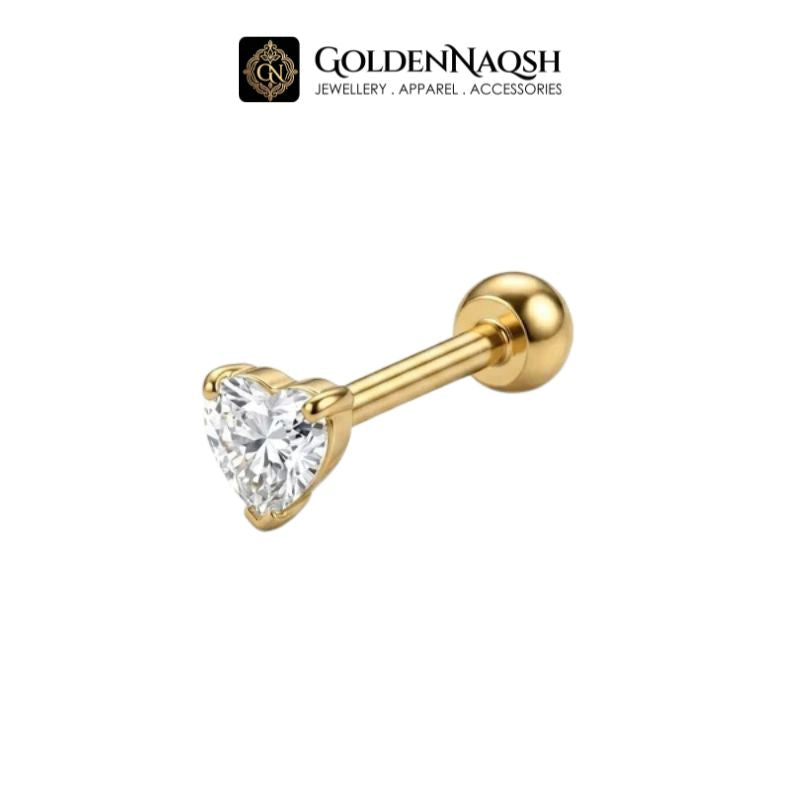 A gold-plated labret stud earring featuring a heart-shaped clear gemstone in a prong setting, shown against a plain white background with the GoldenNaqsh brand logo at the top.