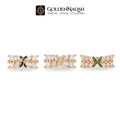 Three gold rings with marquise-cut clear stones and accent colors (black, white, green) displayed on a white background with the GoldenNaqsh brand logo at the top.