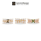 Three gold rings with marquise-cut clear stones and accent colors (black, white, green) displayed on a white background with the GoldenNaqsh brand logo at the top.