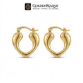 A pair of gold hoop earrings with a polished, sculptural organic shape, displayed on a clean white background with the GoldenNaqsh brand logo at the top.