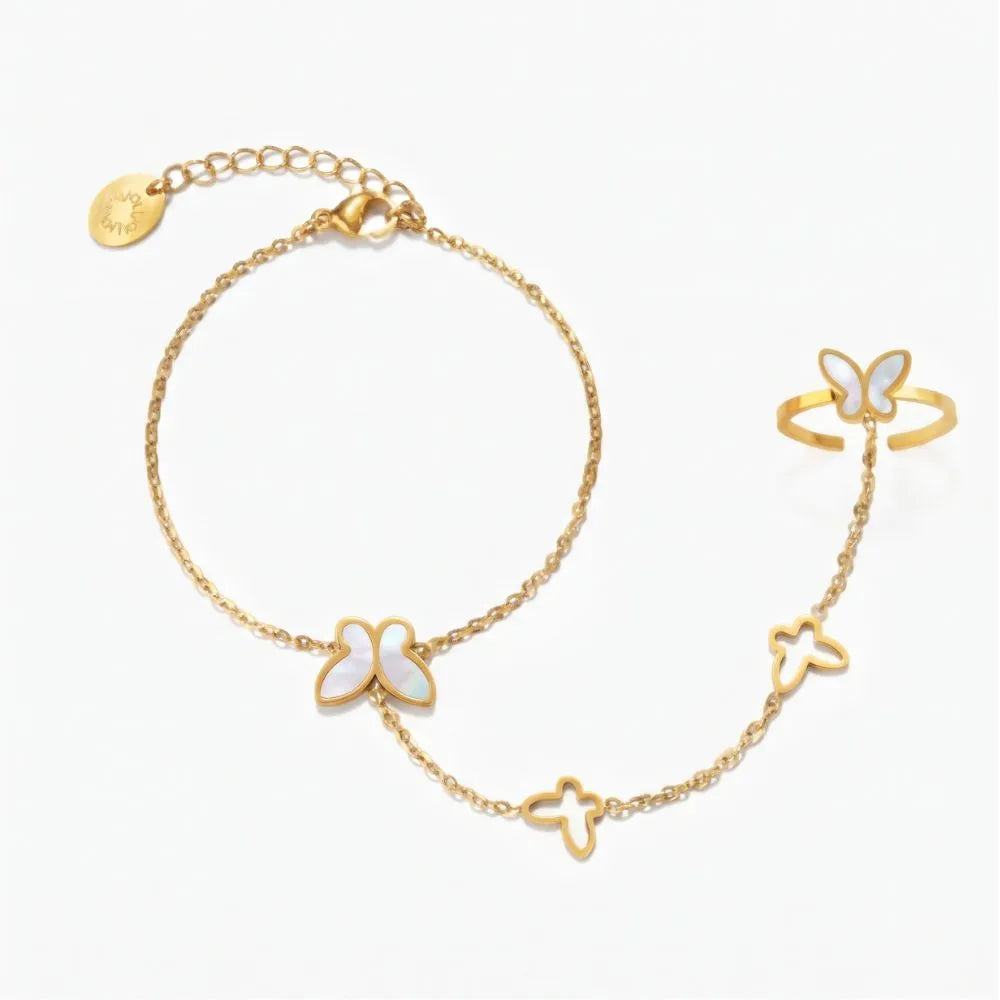 Golden Naqsh Butterfly Hand Chain Bracelet featuring a connected finger ring, white mother-of-pearl butterfly accents, and a delicate gold link chain