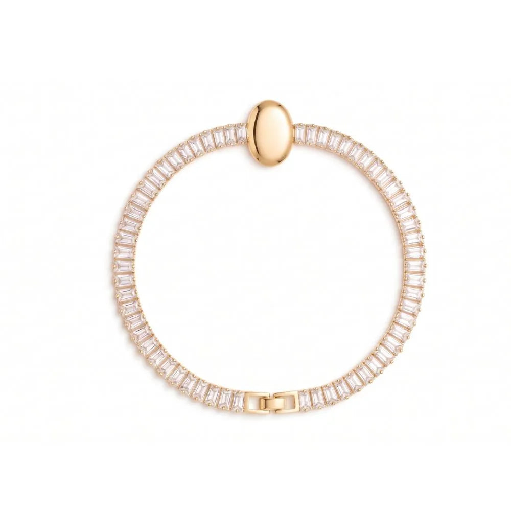 Golden Naqsh Oval Diamond Bracelet featuring sparkling baguette stones and a polished gold oval centerpiece against a clean white background