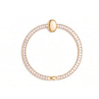 Golden Naqsh Oval Diamond Bracelet featuring sparkling baguette stones and a polished gold oval centerpiece against a clean white background