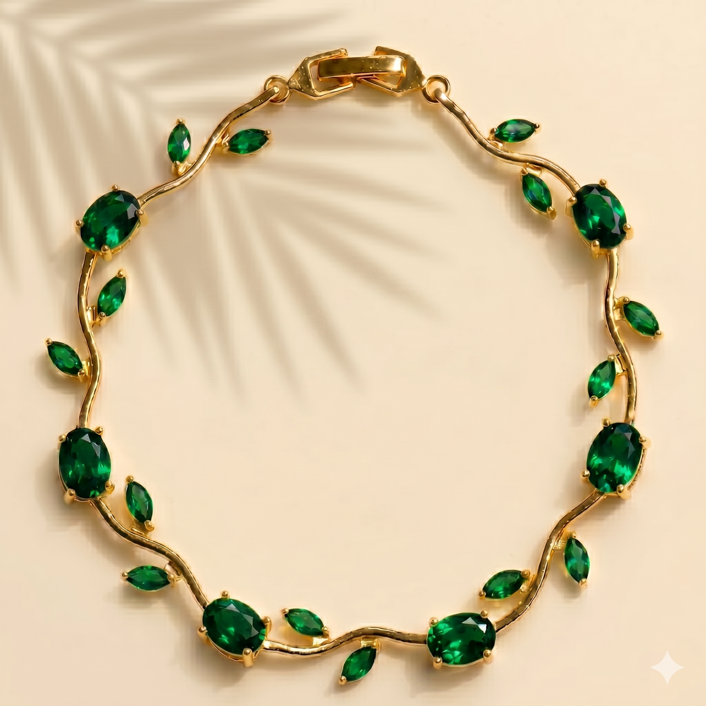 Gold bracelet with green gemstones on a beige background