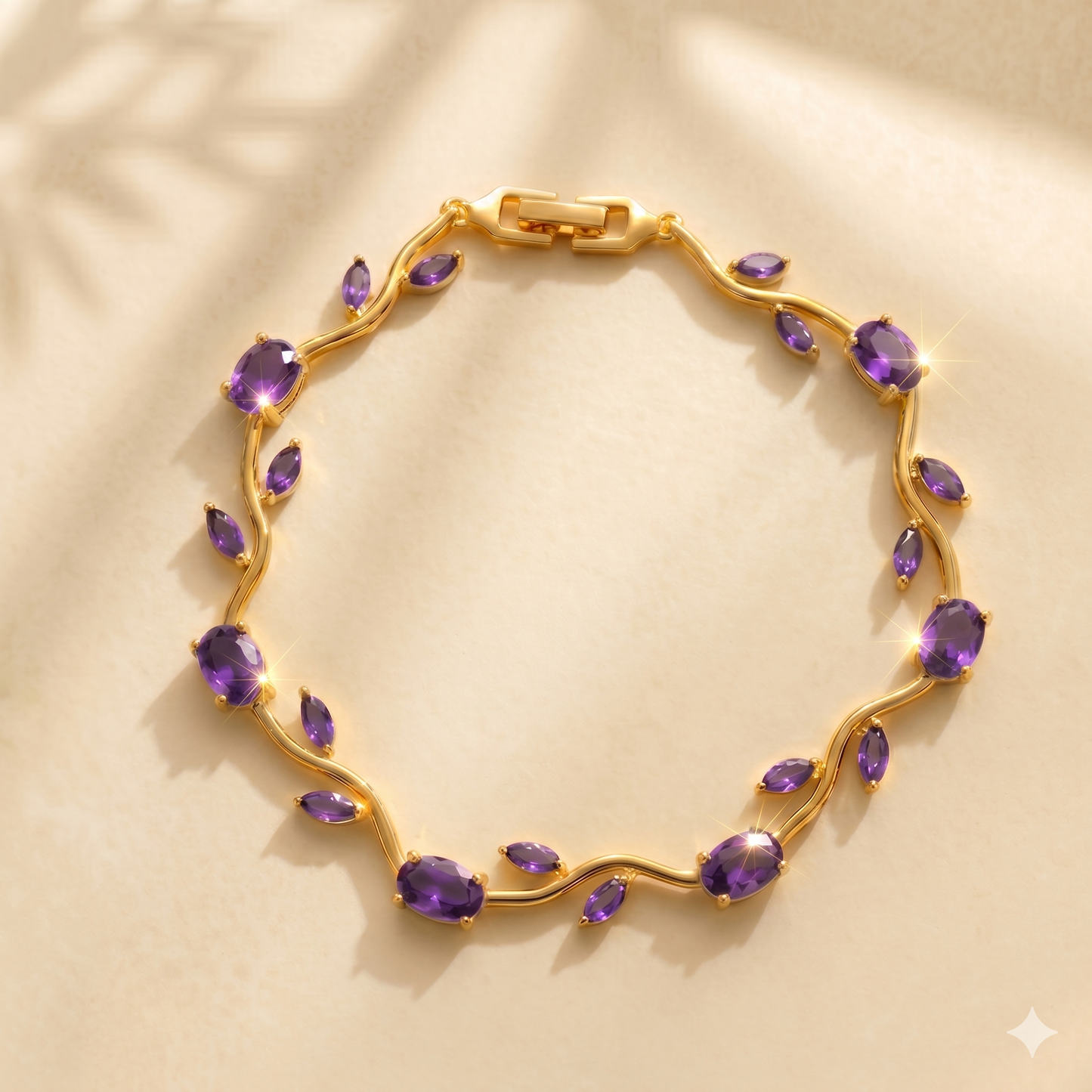 Gold bracelet with purple gemstones on a beige background